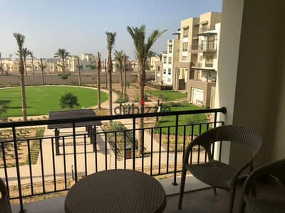 Luxurious Uptown Cairo Living: 2 Master Bedrooms, Garden Views