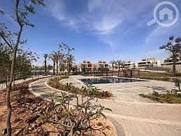 Apartment 207 meter Ready to Move  facing north view landscaped scenery in Palm Hills Capital Gardens. 0