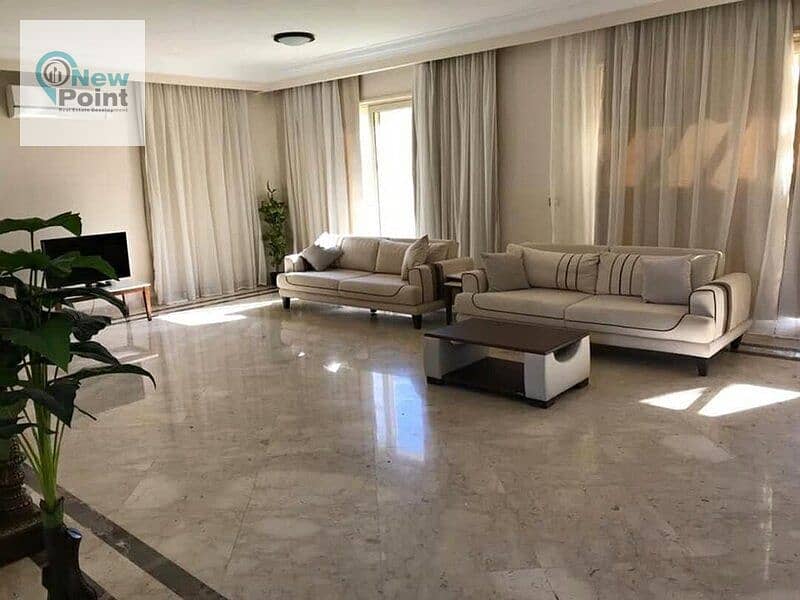 A distinctive ground floor apartment with a garden for sale in Palm Hills New Cairo Direct Compound, directly on the Ring Road 4