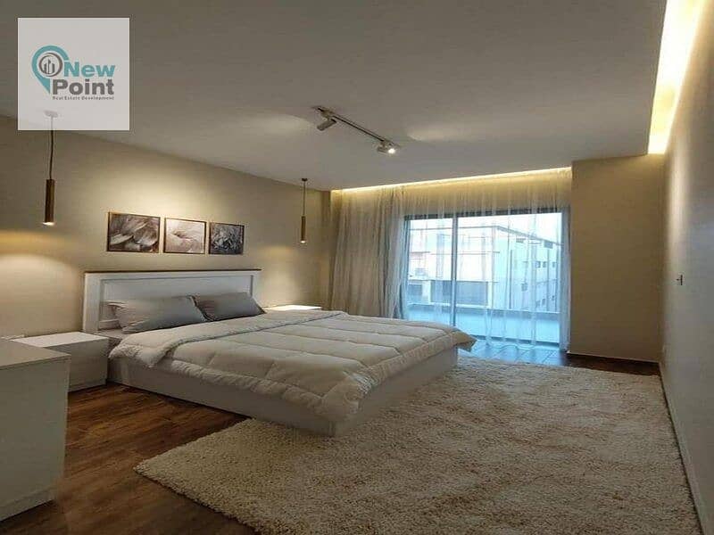 A distinctive ground floor apartment with a garden for sale in Palm Hills New Cairo Direct Compound, directly on the Ring Road 5