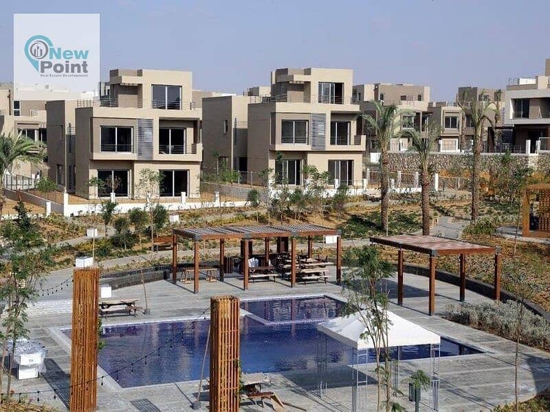 Ultra super deluxe finished apartment directly on the lagoon for sale in the most distinguished phase in Palm Hills New Cairo Compound, Cleo Phase 2