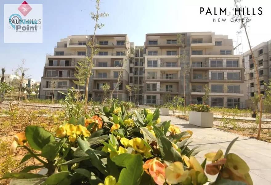 Ultra super deluxe finished apartment directly on the lagoon for sale in the most distinguished phase in Palm Hills New Cairo Compound, Cleo Phase 7