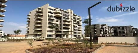 resale apartment with open view  il Bosco City Compound - New Mostakbal City   Misr Italia Compound is a full-service compound