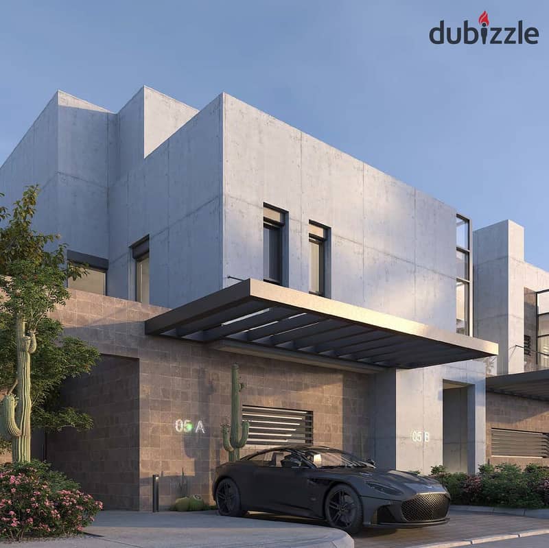 Your villa at the lowest price with installment plans in Karma Gates, the best compound in Sheikh Zayed, directly on Dahshur Road 2