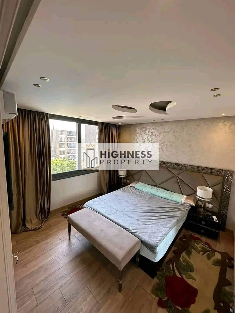 Apartment for sale, ground floor, area of ​​166 meters, at a special price, and a garden of 100 meters , directly on Suez Road, in Taj City, New Cairo 11