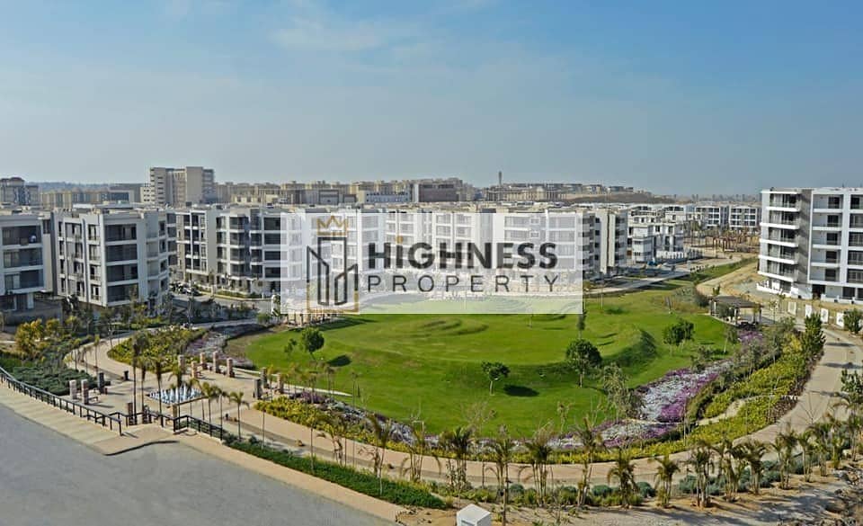 Apartment for sale, ground floor, area of ​​166 meters, at a special price, and a garden of 100 meters , directly on Suez Road, in Taj City, New Cairo 12