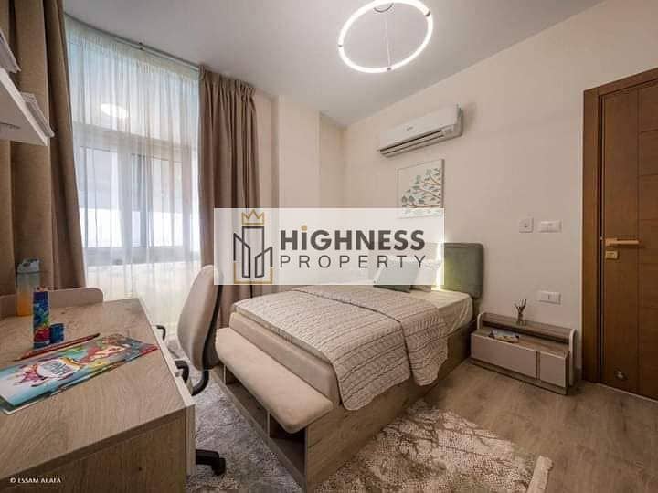 Apartment for sale, 136 meters, at a very special price, directly in front of the airport, next to the Kempinski Hotel in New Cairo, Taj City Compound 7