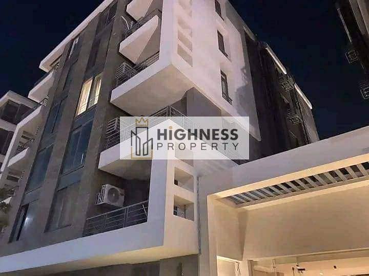 Apartment for sale, 136 meters, at a very special price, directly in front of the airport, next to the Kempinski Hotel in New Cairo, Taj City Compound 31