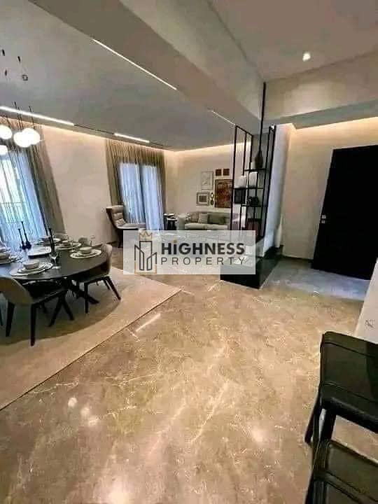 Apartment for sale, 136 meters, at a very special price, directly in front of the airport, next to the Kempinski Hotel in New Cairo, Taj City Compound 33