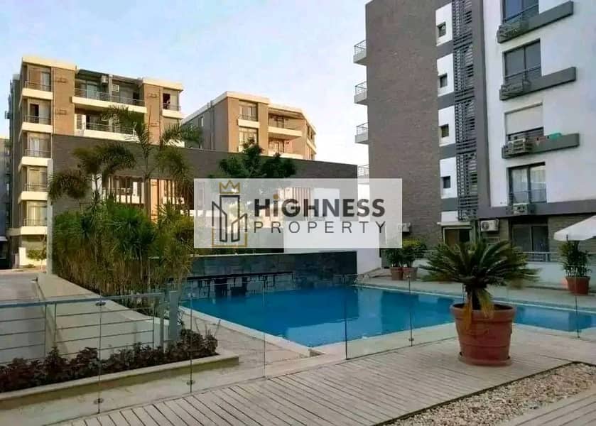 Latest apartment for sale, ground floor, garden, at a special price, area of ​​136 meters, garden of 128 meters in Taj City Compound,  New Cairo 1