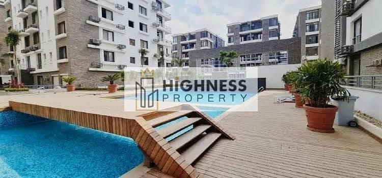 Latest apartment for sale, ground floor, garden, at a special price, area of ​​136 meters, garden of 128 meters in Taj City Compound,  New Cairo 5