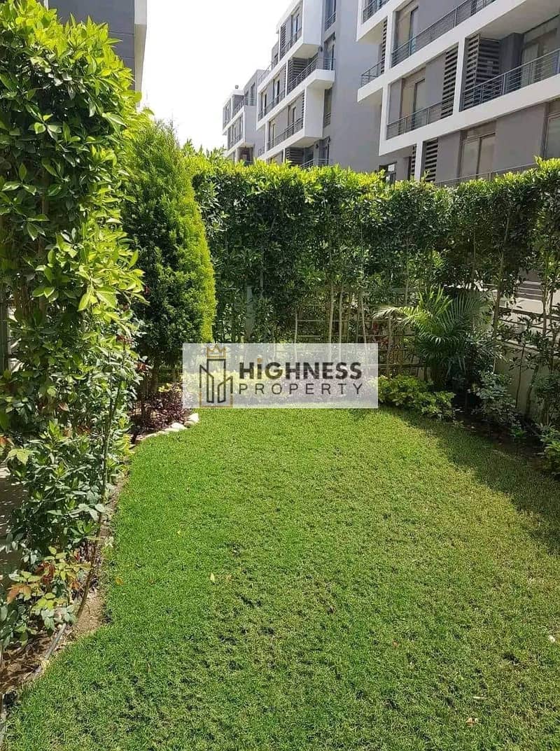 Latest apartment for sale, ground floor, garden, at a special price, area of ​​136 meters, garden of 128 meters in Taj City Compound,  New Cairo 7