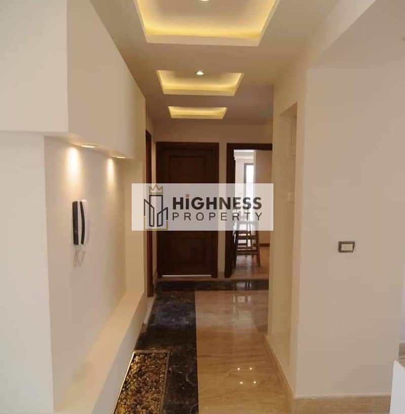 Latest apartment for sale, ground floor, garden, at a special price, area of ​​136 meters, garden of 128 meters in Taj City Compound,  New Cairo 15