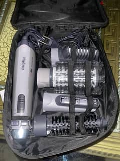 Babyliss 4 in 1 hair dryer, straightner and curler