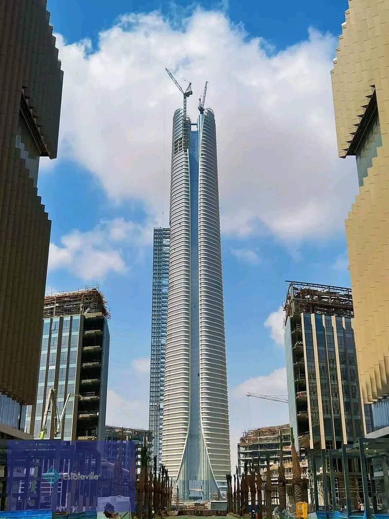 With a 15% discount, a skyscraper office in the Central Business District in front of the Iconic Tower and the Green River, first row on Bin Zayed Axi 7