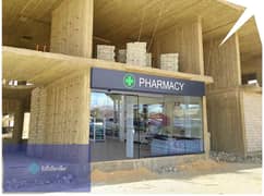 Pharmacy immediate receipt serving a medical building and a fence with a fence with the largest hospital and in the middle of 250 thousand people next 0