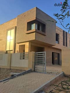 Quattro Villa for sale in Taj City Compound in New Cairo on Suez Road, 143 m, distinctive division, with a 42% discount on cash in the Origami Golf ph