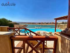 For sale, a finished townhouse villa with air conditioners and kitchen, first row on the Lagoon in El Gouna