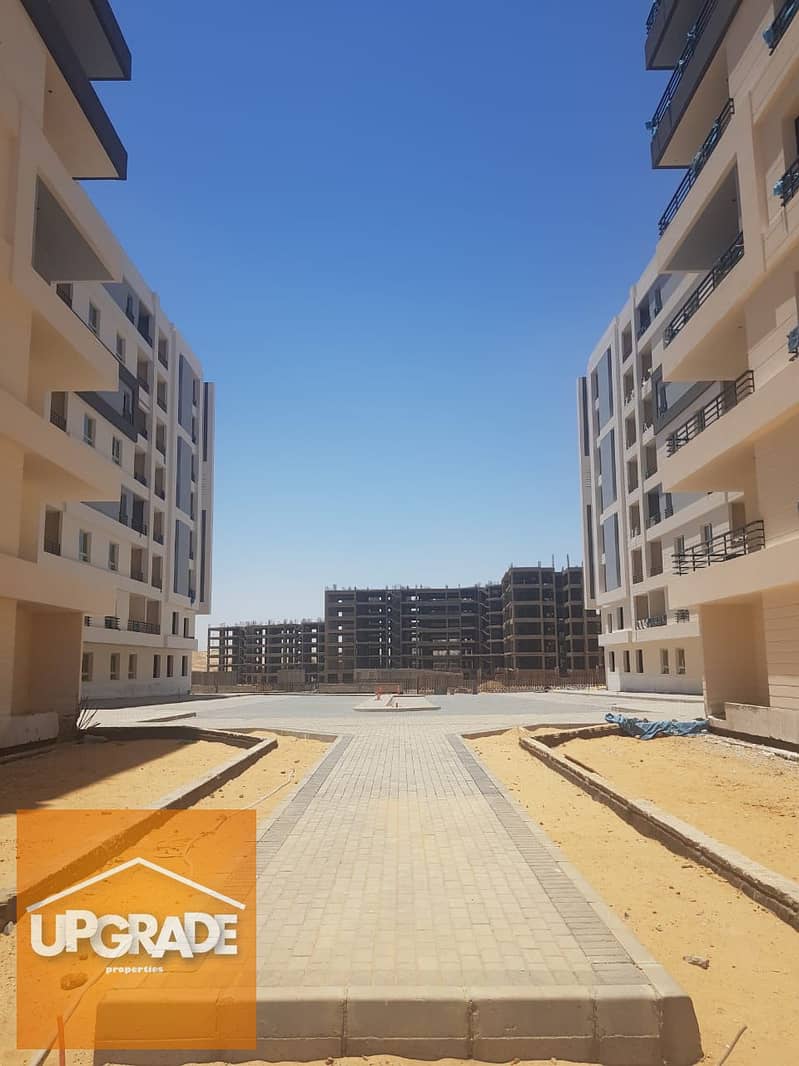 Apartment 243 meters, 4 rooms, immediate receipt, distinctive view, Mondo Compound, the new administrative capital, installments up to 8 years 8