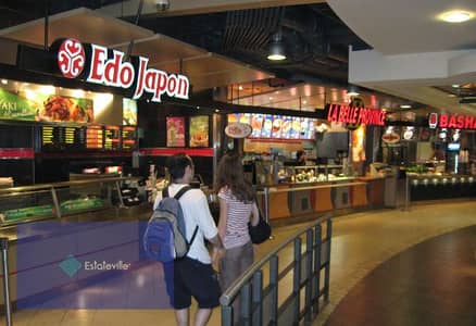 A food court restaurant in front of the tables, facing the mall and the sports city, with the highest rental return