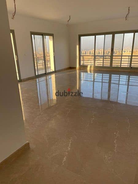 Apartment for sale in Uptown Cairo Open View directly on Golf Fourteen with kitchen 8