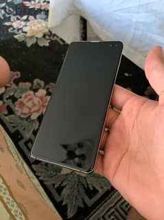 SAMSUNG S10+ with a box