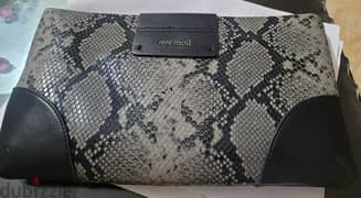 pepe moll clutch