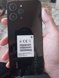 جهاز Redmi 12 مساحه 256 جيجا في كسر بسيط ف الباغه موضح ف الصور