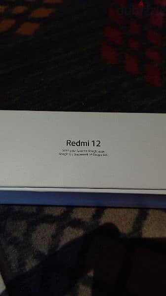 جهاز Redmi 12 مساحه 256 جيجا في كسر بسيط ف الباغه موضح ف الصور 1