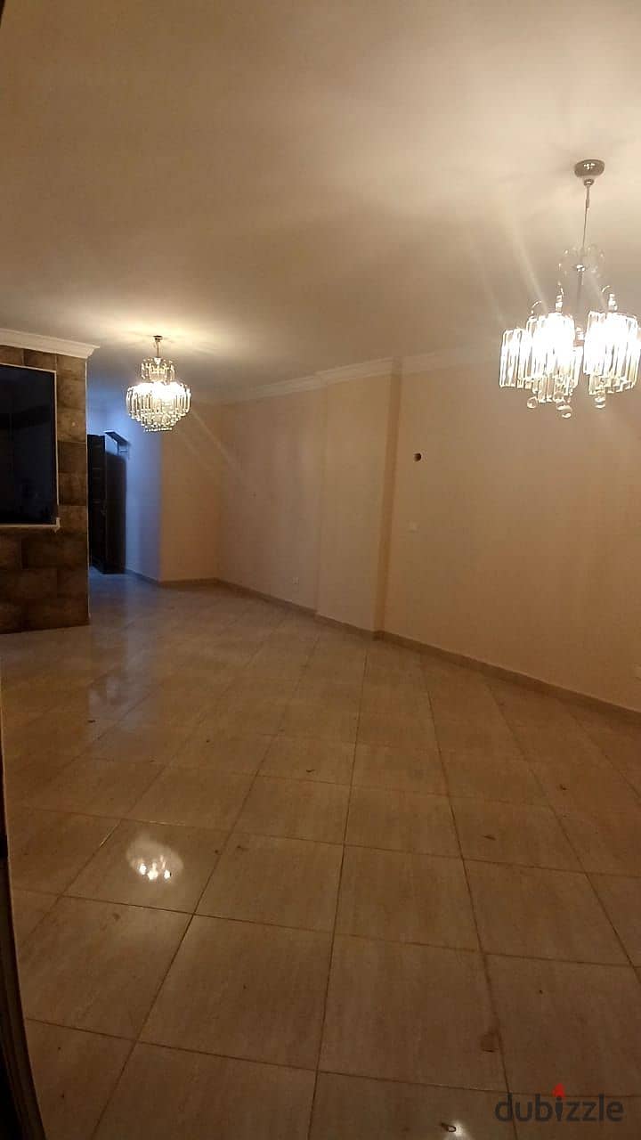 A spacious apartment for rent in Dar Misr Al-Qronfol Compound, First Settlement, in front of Gate 24 Al-Rehab 1