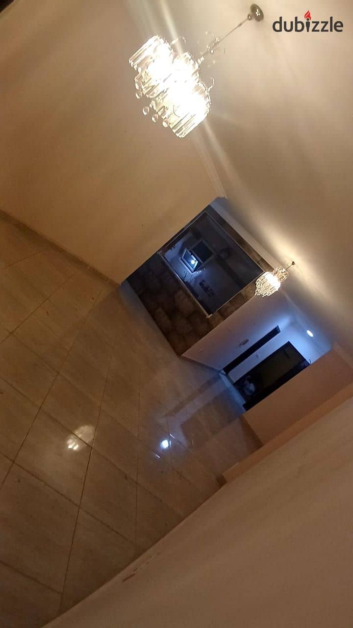 A spacious apartment for rent in Dar Misr Al-Qronfol Compound, First Settlement, in front of Gate 24 Al-Rehab 3