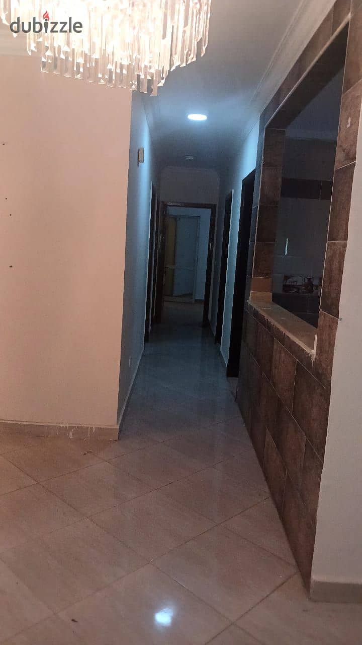 A spacious apartment for rent in Dar Misr Al-Qronfol Compound, First Settlement, in front of Gate 24 Al-Rehab 4