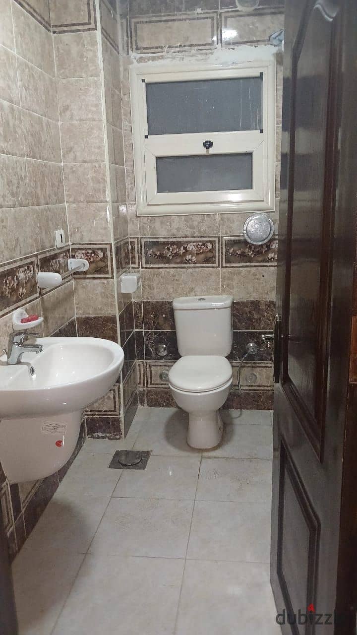 A spacious apartment for rent in Dar Misr Al-Qronfol Compound, First Settlement, in front of Gate 24 Al-Rehab 6