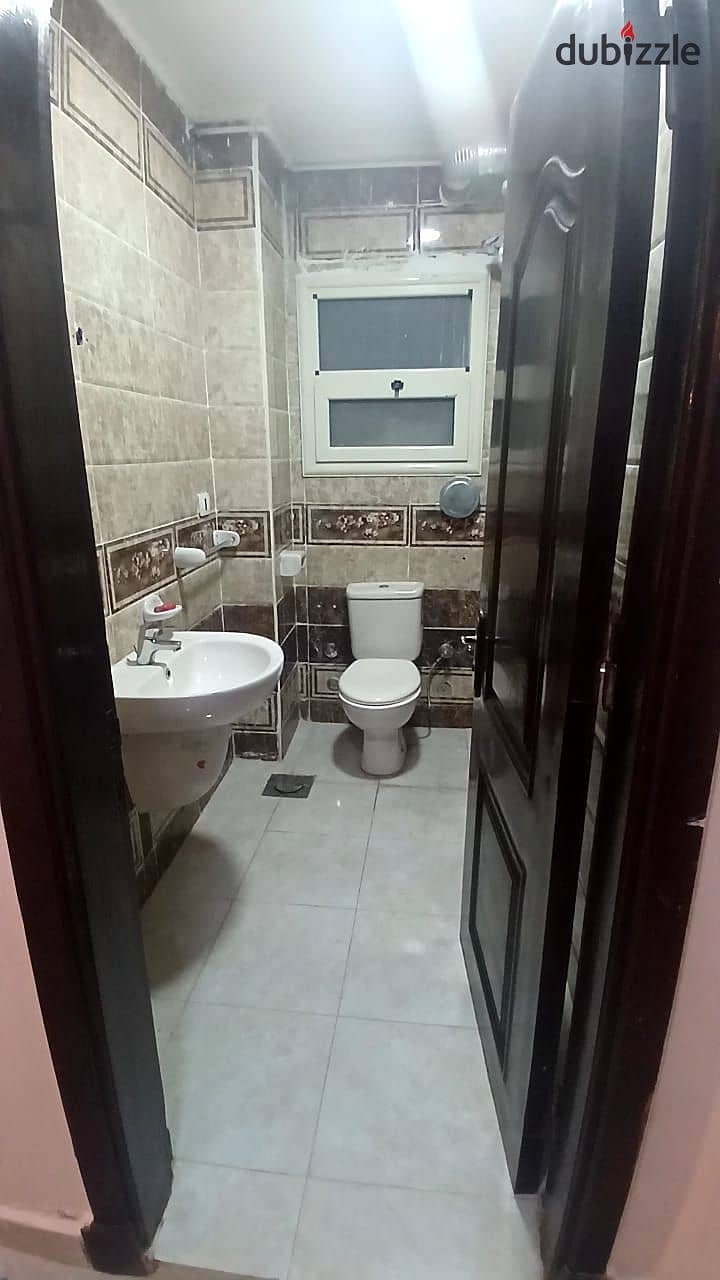 A spacious apartment for rent in Dar Misr Al-Qronfol Compound, First Settlement, in front of Gate 24 Al-Rehab 8