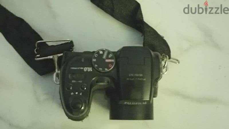 Fujifilm FinePix S1500 - من اجمل الكاميرات للسفر و المبتدئين 2