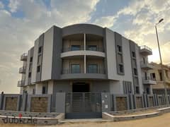 Apartment for sale, first floor, semi-finished, in the West Golf Extension Compound, the second number from Gamal Abdel Nasser Axis and next to Katame