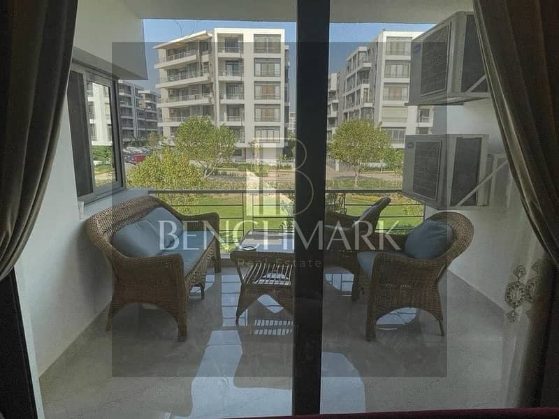 Apartment 136m with Garden 130m for sale in front of Cairo Airport in Taj City compound Origami Golf phase, First Settlement, New Cairo, 42% discount. 2