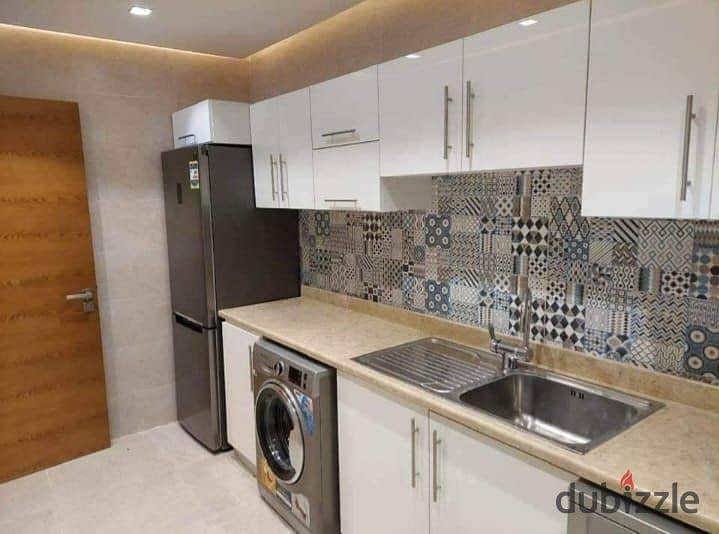 Apartment in El Alamein Towers, close receipt, with air conditioners, super luxury finishing 7