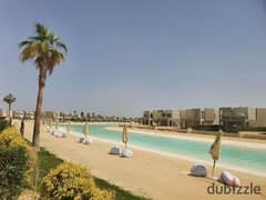 For sale, the last two-bedroom chalet, 127 m + garden, with a direct sea view, in Azha Ras El Hekma, New Alamein, with a 30% discount