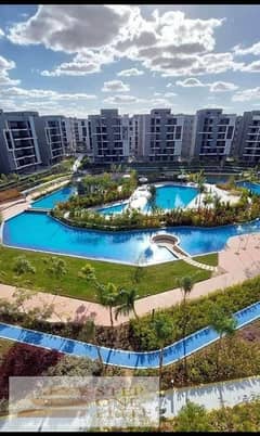 Apartment with private garden for sale in convenient installments near Mall of Egypt and Zewail City