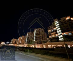 Fully finished apartment for sale With only 293k dp in Downtown City Edge infront of New Alamien Towers , North Coast , 1 hour from RAS EL-HEKMA