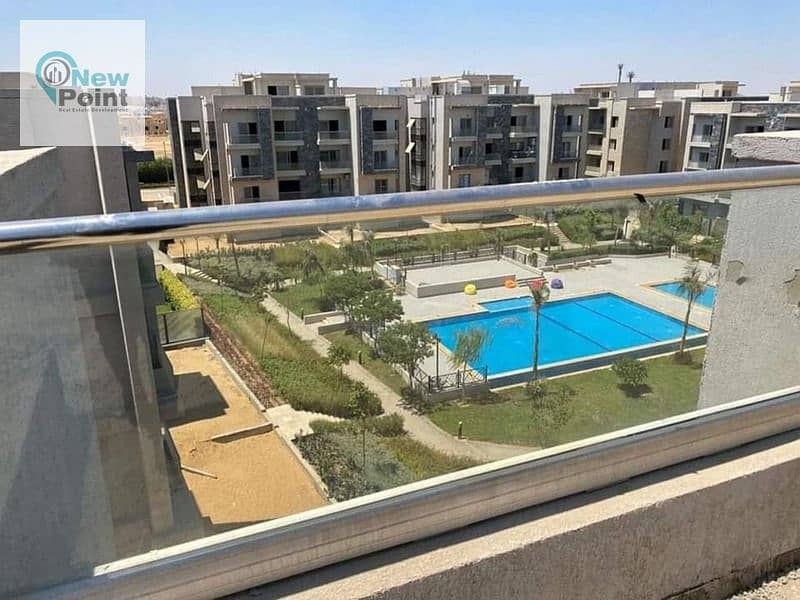 Receive a 123m2 two-bedroom apartment next to Palm Hills in the quietest area in New Cairo 5