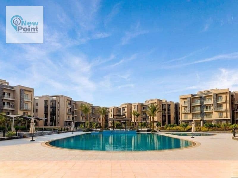 Receive a 123m2 two-bedroom apartment next to Palm Hills in the quietest area in New Cairo 8