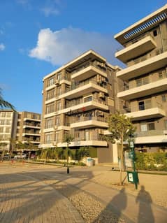 Apartment for sale in installments on a very special view on the landscape in front of Cairo Airport in the Taj City compound along Heliopolis