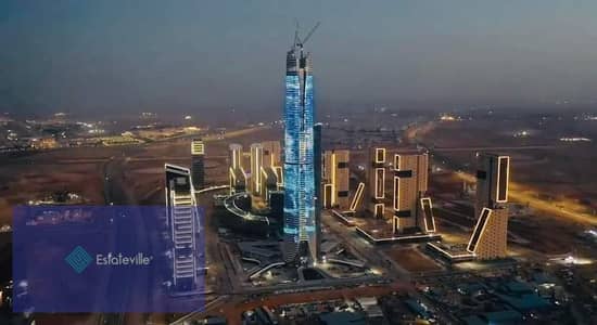 A food court store in a skyscraper in front of the entrance to the iconic tower, first row, in the heart of the Green River and Bin Zayed Axis in the