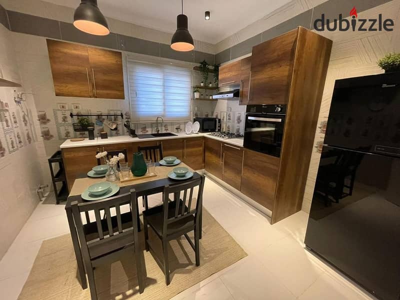 Apartment for sale, ready for receipt, fully finished, in Al Maqsad Compound, City Edge Company and the Housing and Development Bank 1