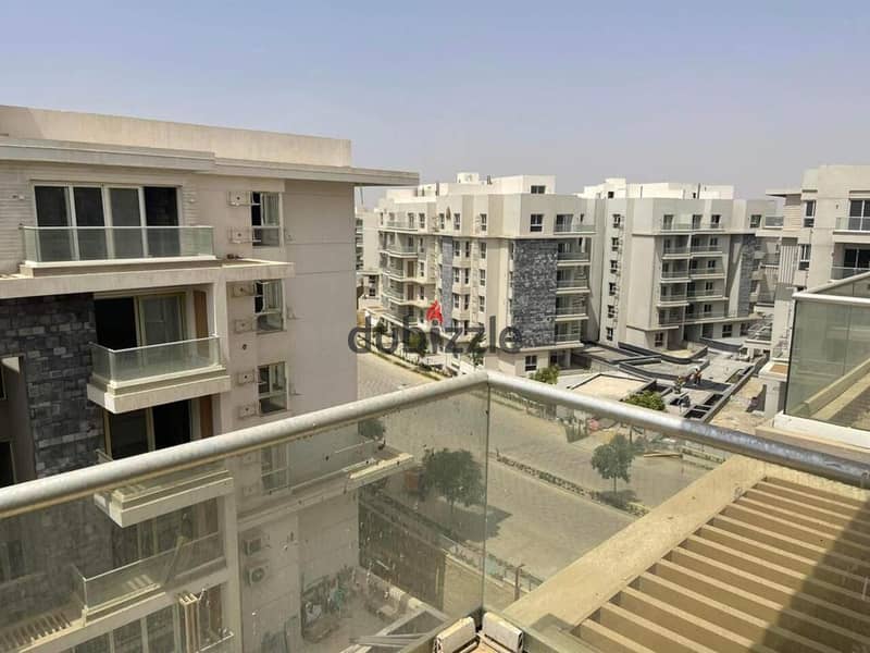 apartment for sale at mountain view icity new cairo | Ready to move | prime loction | with garden 8