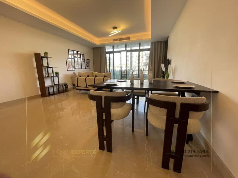 A luxury furnished apartment ground floor with garden  for rent in  Compound cairo festival city , Fifth Settlement 7