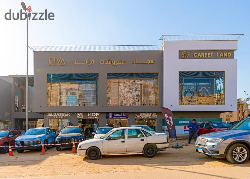 A store for sale in the Fifth Settlement, rented with a monthly return, in The Market Mall, next to the Gomla Market 2