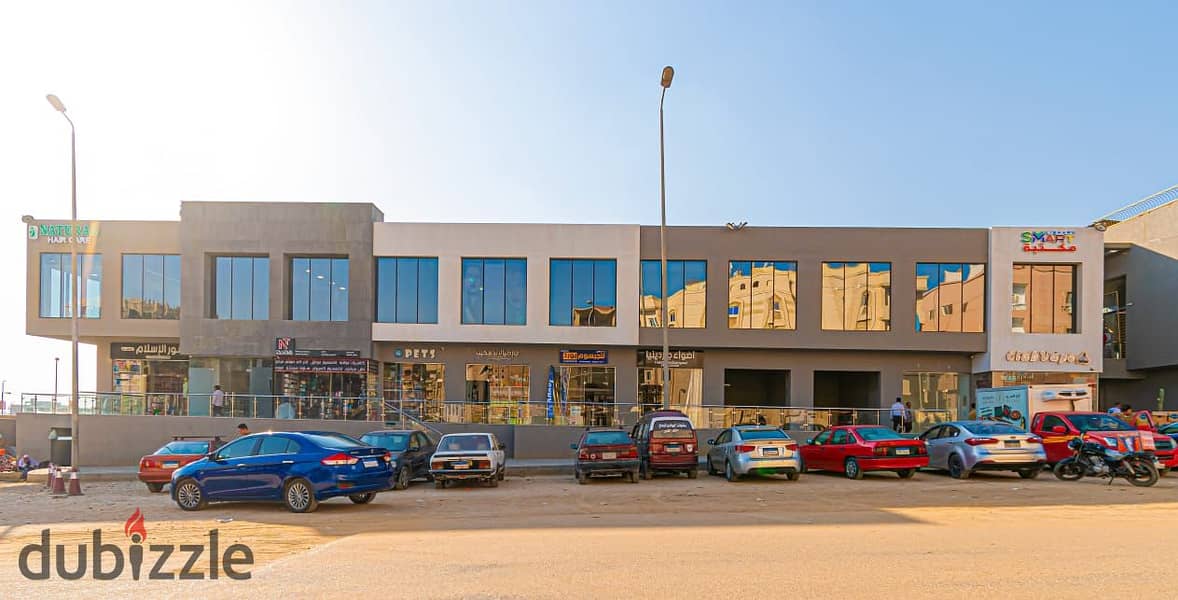 A store for sale in the Fifth Settlement, rented with a monthly return, in The Market Mall, next to the Gomla Market 3